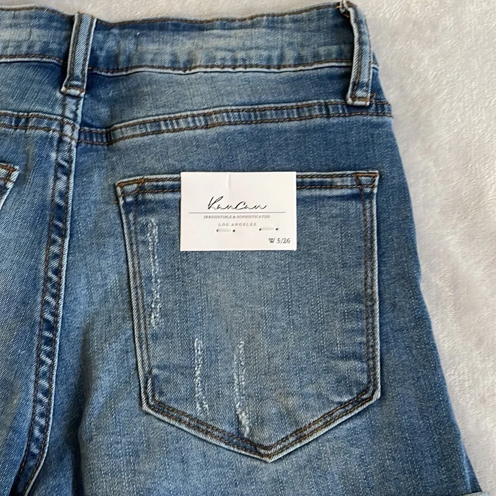 Kancan mid rise medium wash distressed five pocket size 5 size 26 jean shorts
